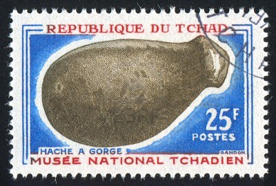 11049958-chad--circa-1966-stamp-printed-by-chad-shows-prehistoric-tool-stone-axe-circa-1966.jpg
